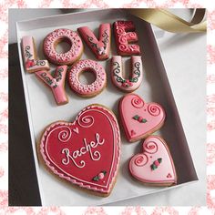 decorated cookies in a box with the words love you