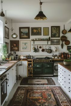 a kitchen with green stove top oven and lots of pictures on the wall