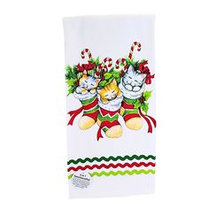 a white towel with three cats on it and candy canes in the background,