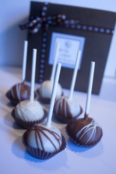 chocolate covered candies are sitting on a table