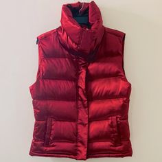 Talbots Deep Down Red High Zip Puffer Vest Beautiful Claret Red Puffer Vest Just In Time For The Holidays! The Rich Deep Red Feels Luxurious Zip Front Stand Collar On-Seam Welt Pockets With Hidden Snap Closure Horizontal And Diagonal Quilting Fully Lined Below The Waist Excellent Barely Worn Condition The Vibe Is Cottagecore Barbiecore Western Prairie Farm Boho “Shabby Chic” Country Fancy French Bohemian Crop Urban Cottage, Traditional Shack Vintage Kuromi Baddie Academia Light Preppy Ethereal F Red Quilted Vest Outfit, Luxury Fitted Red Vest, Fitted Red Winter Vest, Red Retro Winter Vest, Red Sleeveless Vest Outerwear, French Bohemian, Red Puffer Vest, Urban Cottage, Claret Red