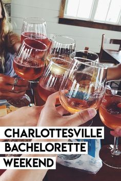 people holding up wine glasses with the words charlottesville bachelor weekend written on one side