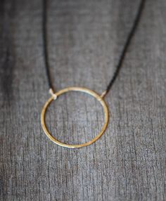 Large (28mm) hand hammered and polished circle on delicate but sturdy chain.  A classic design great for simple styling and a go to layering piece.The circles are gold filled or sterling silver for durability and a long life with you, they are not gold plated or vermeil.  Create the style combo just right for you in the pull down menu.Chain options: GF: gold filled, SS: sterling silver, BLK: ruthenium coated silver Minimalist Hammered 14k Gold-filled Jewelry, Everyday Gold Full Circle Jewelry, Everyday Full Circle Gold Jewelry, Simple Adjustable Hammered Jewelry, Minimalist Circle Jewelry In 14k Gold Filled, Hand Forged Circular Jewelry For Everyday Wear, Everyday Hand Forged Circular Jewelry, Adjustable Circle-shaped Hand Forged Jewelry, Adjustable Circle-shaped Hand-forged Jewelry