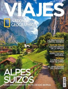 the front cover of a magazine with mountains in the background and trees on either side