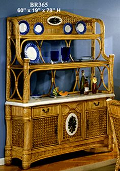 a wicker hutch with plates on it