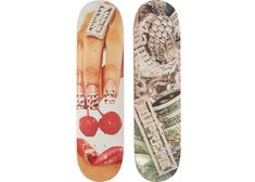 two skateboards with different designs on them, one is white and the other is red