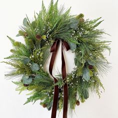 a christmas wreath hanging on the wall