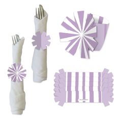 blue and white paper decorations are arranged on top of each other, including napkins