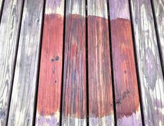 an old wooden deck with peeling paint on it