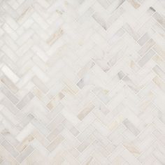 an image of a white tile pattern that looks like it is made out of marble