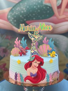 the little mermaid cake has been decorated with fondant and is ready to be eaten