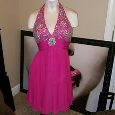 Gorgeous Dress. Hot Pink Halter Style With Yons Of Gorgeous Stones. Chiffon Bottom. Lined. Worn A Couple Of Times. The Top Is Missing A Couple Of Stones But Hardly Noticable Or Could Easily Be Replaced. Dresses Hot Pink, Jovani Dresses, Halter Style, Pink Crystal, Halter Formal Dress, Gorgeous Dresses, Sleeveless Formal Dress, Hot Pink, Cocktail Dress