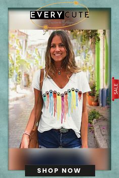 a woman wearing a white shirt and blue jeans with the words every cute on it