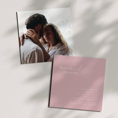 a pink wedding card with a photo of a man and woman hugging each other in front of a white background