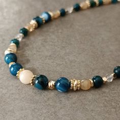 "Elegant Blue Bead Necklace Women ☆ Delivery in 1-4 working days! ☆ Arrives ready for gifting and usually ships same day or next day. The necklace will be sent with a gift! O T H E R ∙ I N F O R M A T I O N Blue Agate size: 8mm Beige Agate size: 8mm Blue Apatite size: 5-6 mm Beige Citrine size: 5-6 mm Clear Quartz size: 3 mm **Intermediate apparatus and beads are non-tarnish gold plated. Length: The length shown on our models are 16\" and 18\" you may select 14-30\" from the drop down menu provided. If you want a size change, please contact us or leave us a message. :) ☆ Each of our necklaces at PEARLOWNJEWELRY are handmade and special natural stones. Necklace is made with positive energy. Each crystal is cleaned before shipment. We update the stock amount according to the custom of stones Luxury Blue Beaded Necklace Gift, Sapphire Beaded Necklace As Gift, Adjustable Sapphire Beaded Necklace Gift, Elegant Blue Crystal Necklaces With Gemstone Beads, Elegant Blue Gemstone Bead Crystal Necklace, Blue Beaded Bracelets With Polished Beads As Gift, Handmade Sapphire Round Bead Necklaces, Blue Necklace With Colorful Beads For Meditation, Blue Beaded Necklace For Gift