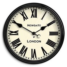 a black and white clock with roman numerals on it's face reads newgate london