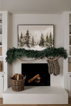 a fireplace with stockings hanging from the mantel and logs in baskets on the mantle