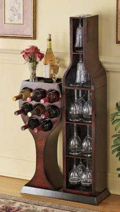 an advertisement for wine bottles and glasses on display in front of a wall mounted shelf