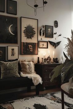 a living room filled with furniture and pictures on the wall