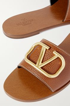 Find VALENTINO Vlogo Textured-leather Slides on Editorialist. Valentino Garavani's slides are topped with the label's 'VLOGO' plaque, which is burnished for an antique effect. They've been crafted in Italy from textured-leather that gets softer over time, so you can comfortably wear them for hours as you wander the local piazzas. Luxury Brown Slides, Designer Brown Slides, Designer Slides With Leather Sole, Designer Calf Leather Slides With Leather Lining, Luxury Leather Slides With Leather Footbed, Luxury Calf Leather Slides With Leather Footbed, Luxury Slides With Calf Leather Footbed, Luxury Slides With Leather Footbed And Calf Leather, Luxury Leather Sandals With Logo