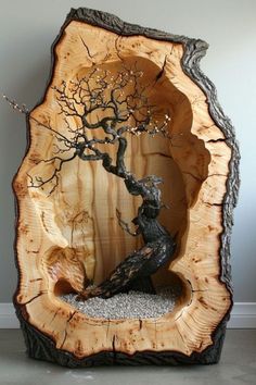 a wooden sculpture with a tree inside of it