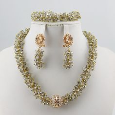 This is for high quality  handmade crystal jewelry set ,it takes 3-5 days for the production Gold Beaded Rhinestone Necklace For Wedding, Gold Crystal Jewelry For Jewelry Making, Gold Crystal Jewelry Sets With Rhinestones, Crystal Jewelry With Rhinestones For Crafting, Gold Jewelry Sets With Rhinestones And Crystal, Gold Crystal Bridal Sets For Party, Crystal Rhinestone Wedding Jewelry, Bling Wedding Costume Jewelry Sets, Wedding Bling Costume Jewelry Sets