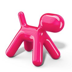 a pink plastic letter k on a white background