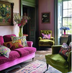 a living room filled with furniture and flowers