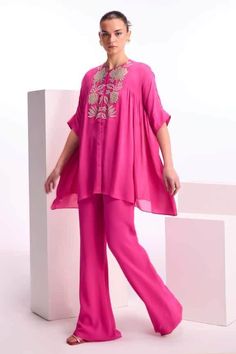 ✨This beautiful pink tunic pant set is embellished with beads and sequin work at the front neck. ✨This outfit is perfect of this festive season, wedding function and party.  ✨If you want any changes in the outfit people contact us we will guide you as per your preference. ✨We assure you that we use only high quality fabric and threads to make any dress and you won't face any problem regarding fabric.  ✨Sometimes we take little longer time manufacturer the outfit as all are dresses are custom mad Indian Cords Outfit, Crepe Cord Set, Pant And Top Set, Placement Pattern, Fancy Dress Patterns, Hand Embroidered Dress, Co Ords Outfits, Short Blouse, Gathered Top