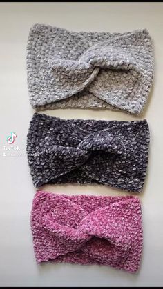 three crocheted headbands are lined up on top of each other