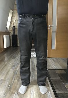 "Vintage Men's AJS Biker Black Leather Pants Motocycle Pants with Knee Protectors. Brand: Louis AJS Materials: 100% Leather . Leather is thick , but very soft. Lining: 100% Polyester  Vintage condition very good. Some general wear. Tag Size: 52  Estimated Size W38 L31 Shown on model Size XL ( Waist: 40\"/ 102cm., Height: 182cm.) Please rely on measurements. Measurements (taken from seam to seam while the garment is lying flat.Double the waist and hips.): Waist: 19\"/ 48cm. Hips: 22  1/2\"/ 57cm. Rise: 11 3/4\"/ 30cm. Inseam: 31\"/ 79cm. Weight: 1515gr Length (with waistband): 42\"//107cm. Please double check measurements to insure a proper fit. Remember to allow yourself some extra room for movement. You can compare this with something from your closet that fits you well. SHIPPING  I ship Casual Black Motorcycle Bottoms, Casual Black Bottoms For Motorcycling, Black Leather Pants With Belt Loops For Motorcycling, Biker Pants With Pockets For Motorcycling, Biker Bottoms Straight Leg For Motorcycling, Biker Style Straight Leg Bottoms For Motorcycling, Biker Straight Leg Bottoms For Motorcycling, Black Bottoms With Pockets For Biker Events, Black Motorcycle Bottoms With Belt Loops