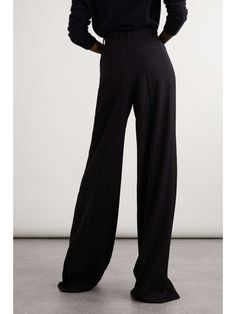 SAINT LAURENT Pleated pinstriped wool-blend wide-leg pants | NET-A-PORTER Striped Wide Leg Formal Pants, Formal Striped Wide Leg Pants, Striped Wide Leg Pants For Formal Occasions, Pinstripe Wide Leg Pants For Formal Occasions, Elegant Fitted Pants With Vertical Stripes, Elegant Striped Office Pants, Elegant Striped Pants For Office, Elegant Pinstripe Dress Pants, Elegant Pinstripe Bottoms For Formal Occasions