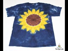 a t - shirt with a sunflower on the front and blue, yellow and brown tie dye