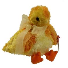 a yellow and orange stuffed animal with a tag on it's chest, sitting upright