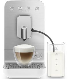 an espresso machine next to a glass of milk