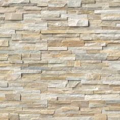 a stone wall that is made out of different types of stones