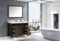 a white bath tub sitting next to a sink in a bathroom under a large mirror