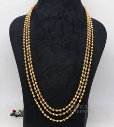 Gorgeous gold polished over 925 sterling silver beads or balls necklace.unique vintage-style handmade jewelry from India. Weight-33.460 grams approx. metal-925 Sterling silver. beads Width-4 mm approx. Type- beads necklace chain. length-20 to 22 inches (20 filst line, 21 middle line and 22inches outer line) Finish-Gold polished over silver. length-Adjustable by back thread. note-gold and silver jewelry is handmade designer jewelry . so there can be a slight difference in the size and weight of t Traditional Gold Multi-strand Jewelry, Gold Multi-strand Necklaces For Festivals, Gold Multi-strand Jewelry For Festivals, Festive Gold Beaded Chain, Gold Beads With Beaded Chain For Festivals, Gold Mala For Jewelry Making And Festivals, Festival Silver Beaded Necklace With Gold Beads, Gold Beaded Necklaces With Silver Beads For Festivals, Festival Silver Jewelry With Gold Beads