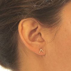 Simple and Modern enough to be worn on a daily basis. These tiny 8mm V's are soldered with solid 10mm sterling silver posts and have a 20mm open triangle that hangs on the back of the ear post. Earring backs and ear nuts are also solid sterling silver. They fit my ears perfectly.  They are lightweight and you do not even notice that they are even there when you are wearing them.  + Material - Copper, Brass, Sterling Silver, 14K Gold, & 14K Rose Gold+ Front Shape - V / Triangle+ Front V Size - 8m Simple Everyday Internally Threaded Jewelry, Simple Internally Threaded Jewelry For Everyday, Double Sided Earrings, Front Back Earrings, Arrow Earrings, Geometric Studs, Moonstone Earrings, Stylish Earring, Stud Set