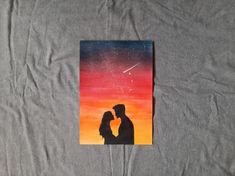 an image of a couple kissing under the stars in the sky on a t - shirt