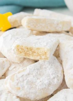 a pile of sugar cookies sitting on top of a table