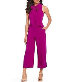 Trina Turk Cash Crepe Bow Tie Neck Cropped Culotte Jumpsuit Luxury V-neck Jumpsuits And Rompers For Cocktail, Affordable V-neck Jumpsuits And Rompers With Pockets, Pink V-neck Jumpsuits For Work, Blue V-neck Jumpsuits And Rompers For Work, Chic Purple V-neck Jumpsuits And Rompers, Jumpsuits And Rompers, Culotte Jumpsuit, Trina Turk, Lace Ruffle