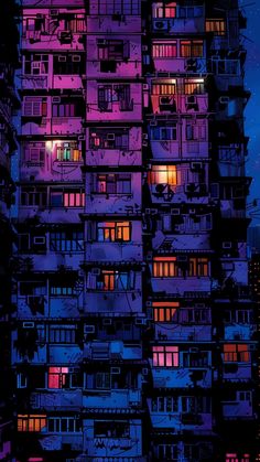 a tall building with lots of windows lit up at night