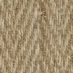 close up view of woven fabric textured with natural colors and pattern, suitable for use as background or wallpaper