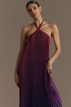 The L'IDÉE Déesse maxi dress is a striking piece designed for elegance and grandeur, featuring dramatic pleats that enhance its exquisite silhouette. With a delicate halter neckline, contemporary inverted hemline, and an open back, this dress exudes an unwavering air of opulence. | Déesse Halter Pleated Maxi Dress by L'IDÉE in Purple, Women's, Size: 10, Polyester at Anthropologie Asymmetrical Evening Dress, Fall Bridesmaid Dresses, Deep Plunge, Red Dresses, Pleated Maxi Dress, Pleated Maxi, Maxi Dress Evening, Maxi Dress Green, Silver Dress