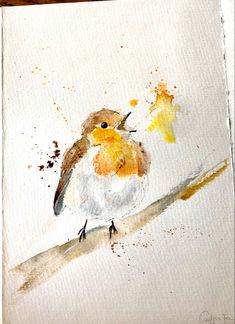 a watercolor painting of a bird sitting on a branch with yellow and brown spots