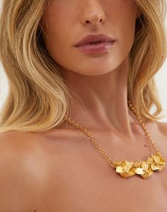 The ViX Carrie Necklace is a gorgeous sculptural necklace that adds a touch of dimension to your look. Complement any look with this gorgeous Carrie necklace.Features: 24k gold-plated ;  Hook closure at back;  Style# VR253018 Carrie Necklace, Sculptural Necklace, Carry On, Gold Plate, Gold Necklace, Sculpture, Gold