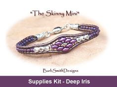 a purple beaded bracelet with silver beads on it and the words, supplies kit deep iris