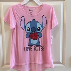 Disney Stitch T Shirt Size L (14). Nwt Themed Short Sleeve Tops For Disney Trips, Cute Character Print T-shirt For Disney Fan Events, Character Graphic Print Short Sleeve Tops, Character Style Cotton Short Sleeve Tops, Pink Disney T-shirt For Disney Trips, Pink Cartoon Print T-shirt For Disney Trips, Cute Character Print Tops For Disney Trips, Cute Tops With Character Print For Disney Trips, Pink Disney Top For Disney Trips