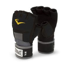 a pair of black and grey boxing gloves with yellow logo on the front, one hand in